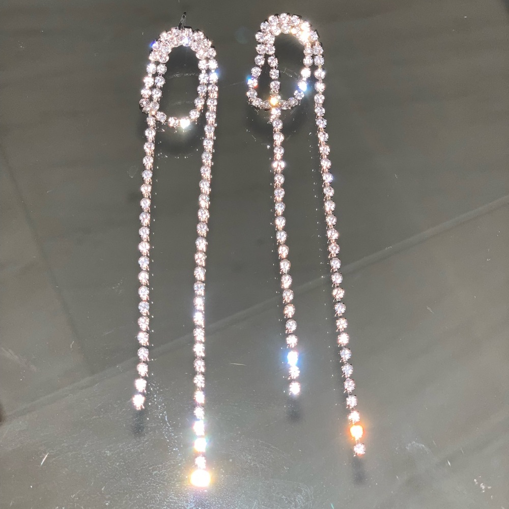 Shashi single loop silver crystal earrings